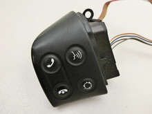 Tecla multifuncional para volante de dirección