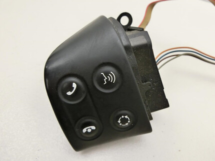 Tecla multifuncional para volante de dirección